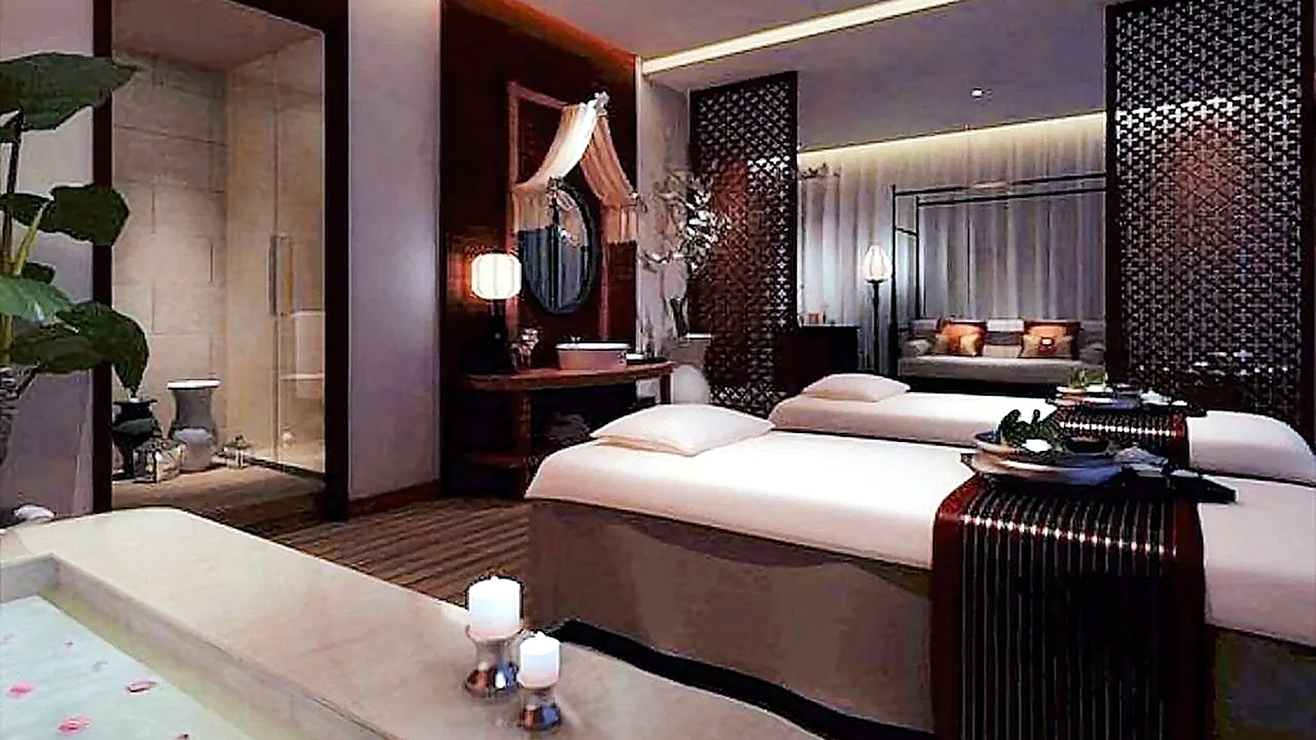 Không gian spa cao cấp với giường trị liệu, ánh sáng ấm và vật liệu tạo cảm giác thư giãn.
