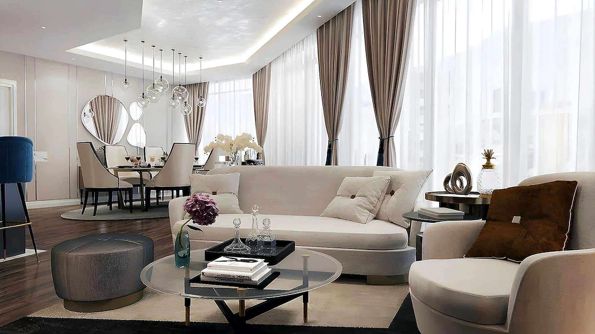 Khu tiếp khách trong suite rộng rãi, sử dụng tông màu sáng và cửa kính lớn.