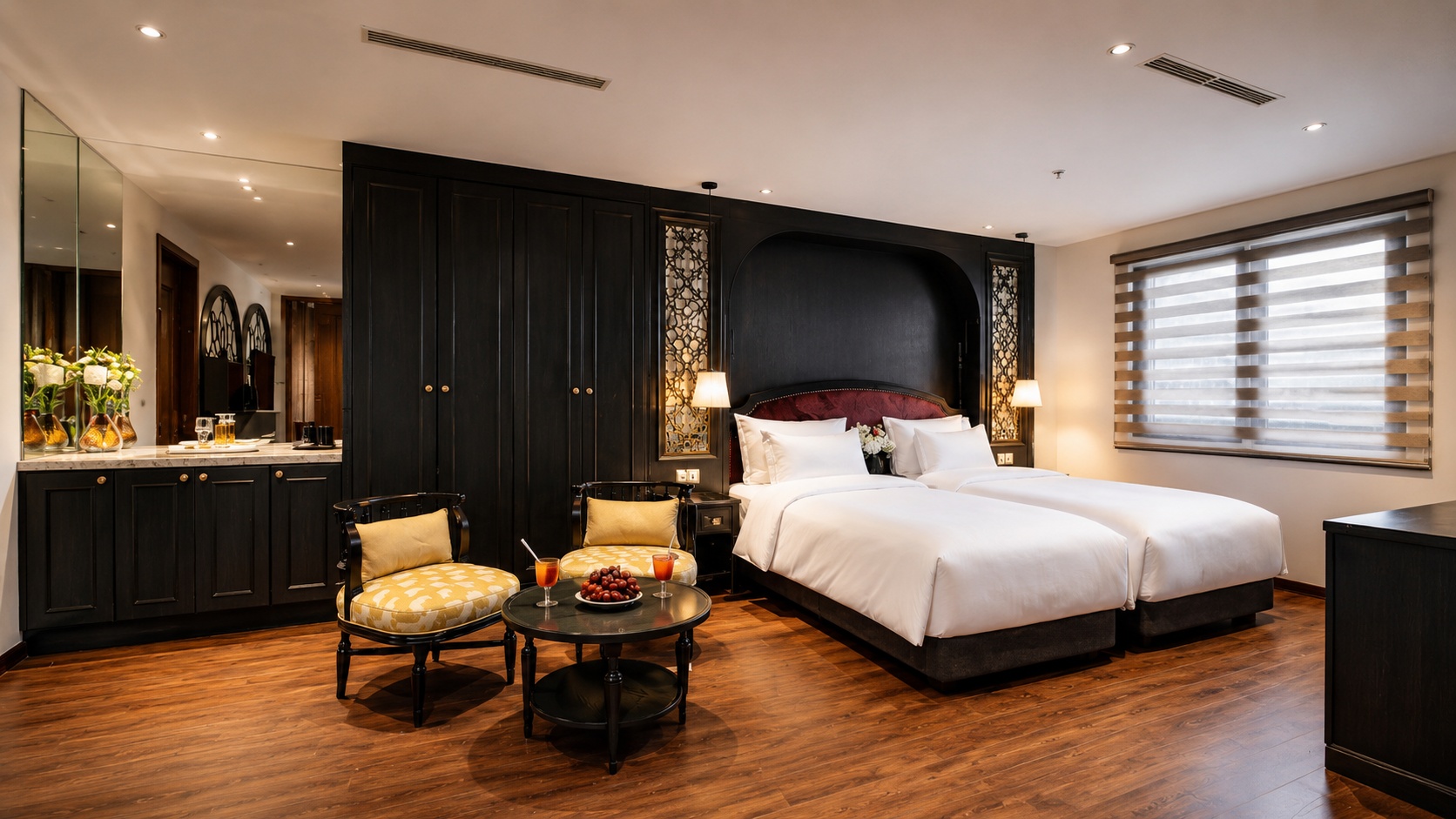 Phòng Suite khách sạn 4 sao hiện đại, bố trí thoáng rộng, nội thất sang trọng và cảm giác nghỉ dưỡng riêng tư. Alt ảnh SEO: "08 phong suite khach san 4 sao hien dai".