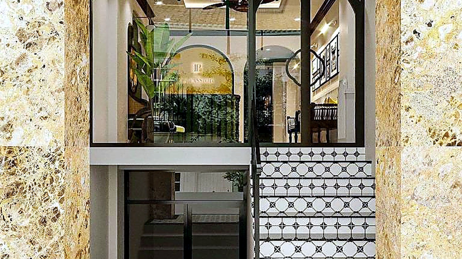 Khu lối vào và cầu thang thể hiện rõ tinh thần Đông Dương qua gạch bông, vòm cong và đường nét đen trắng.