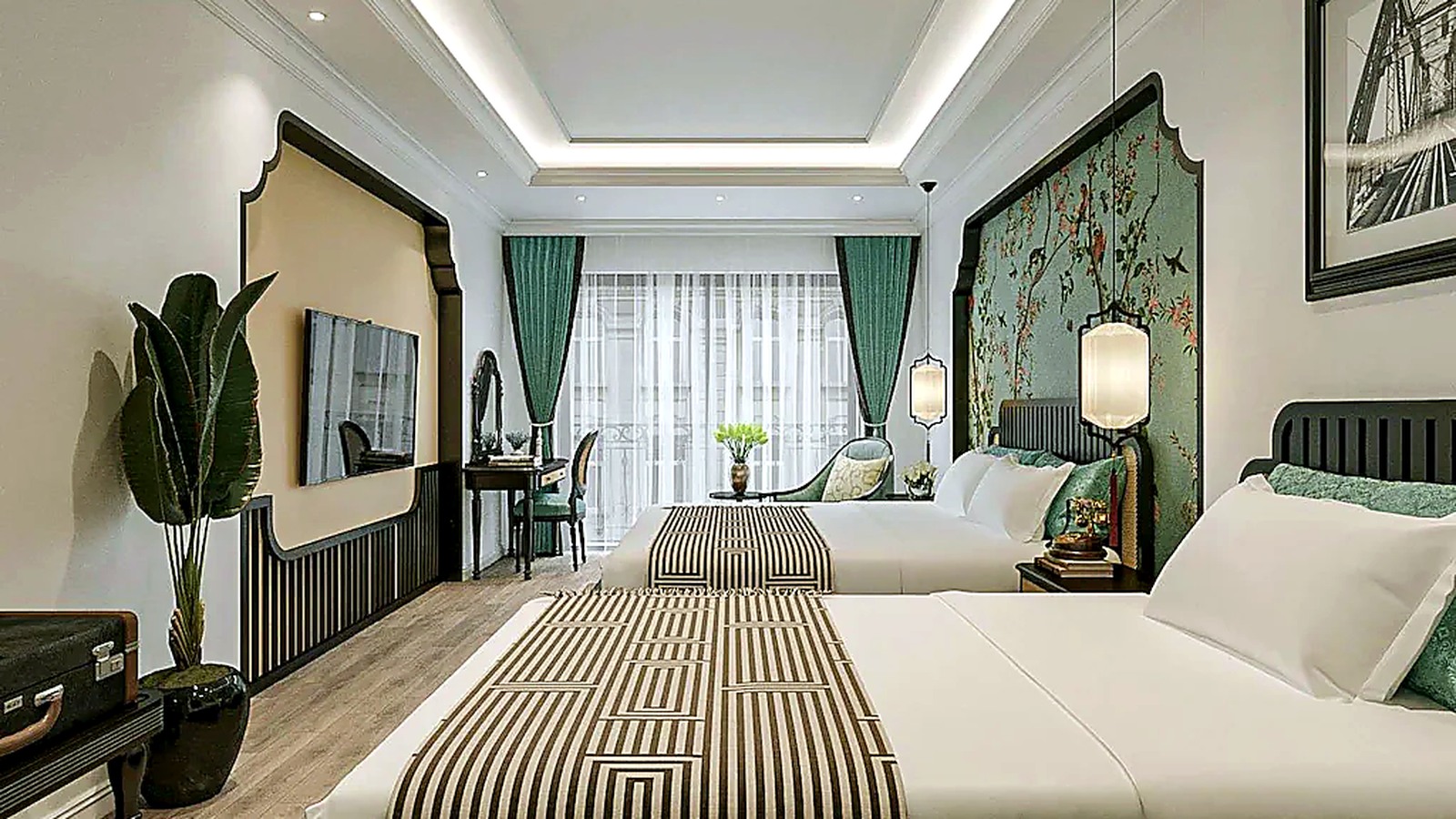 Bố cục cân đối, gam đen trắng và ánh sáng hắt trần giúp căn phòng trông gọn, sang và dễ nghỉ ngơi.