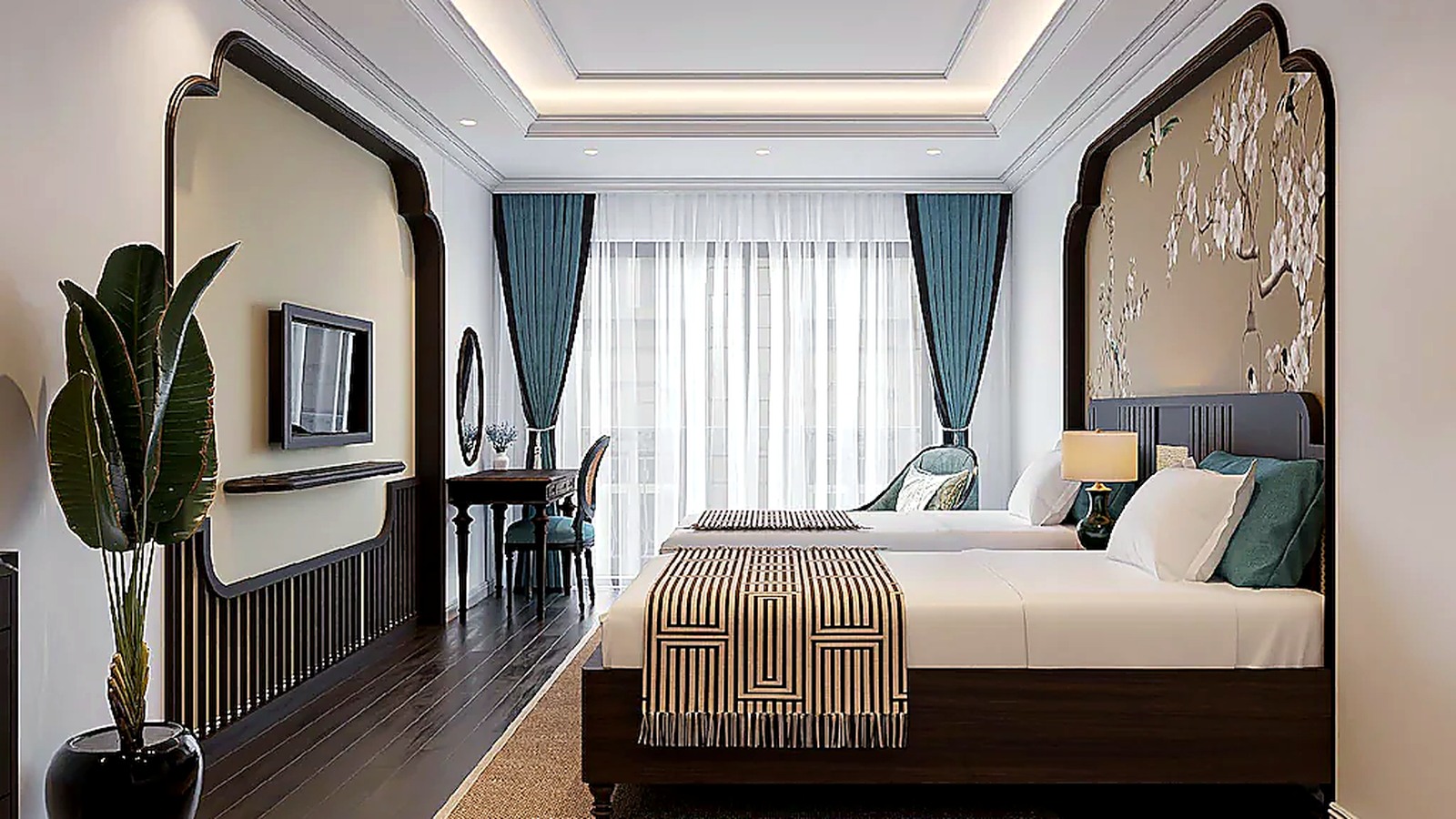 Phòng twin sáng thoáng, dùng tông xanh - trắng - gỗ tối để tạo cảm giác thanh lịch mà vẫn gần gũi.