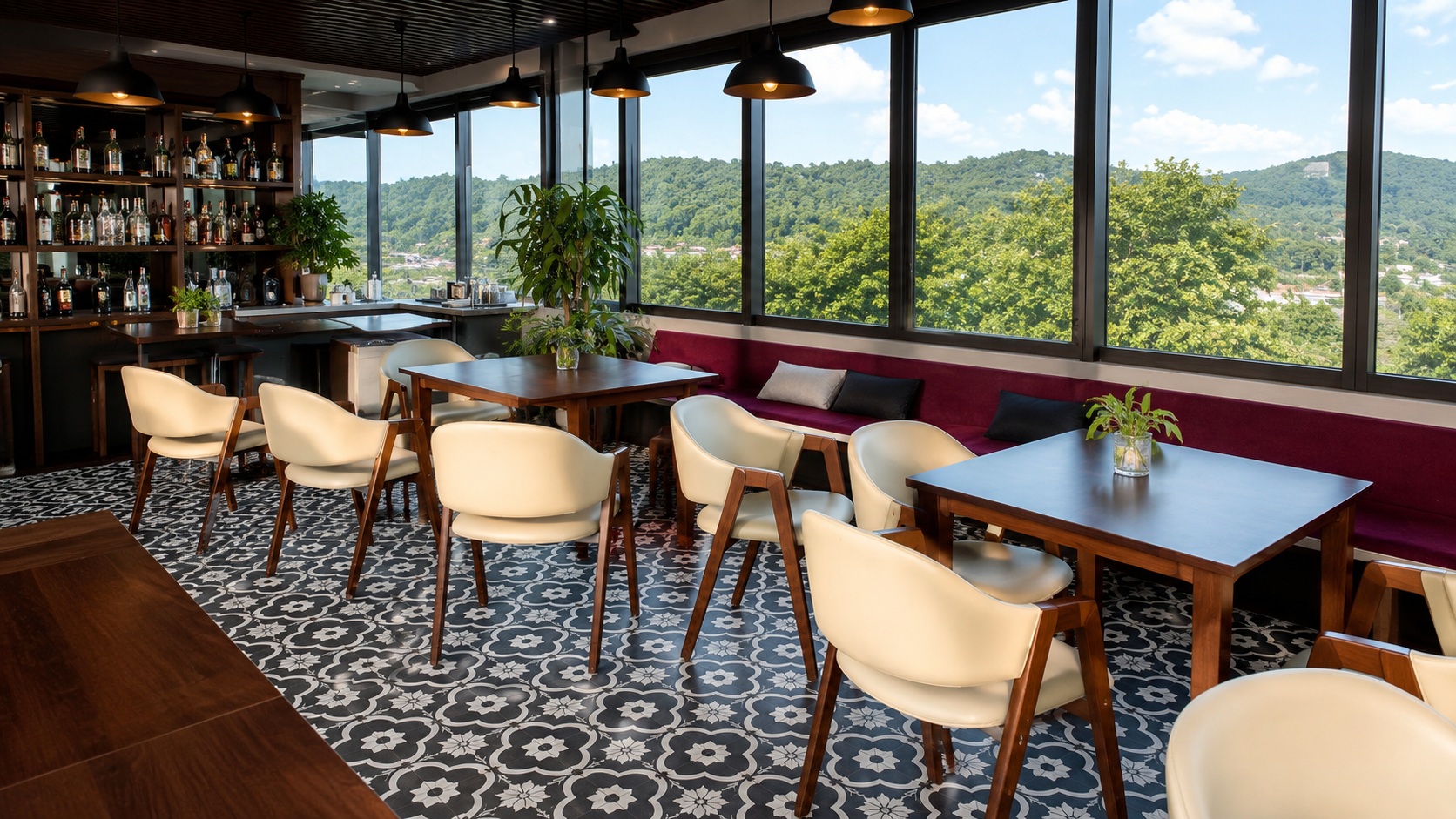 Khu cafe khách sạn 2 sao có cửa kính lớn, sàn gạch hoa và view cây xanh thoáng đãng.